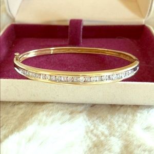 10k Gold Bangle w/ round & baguette cut diamonds